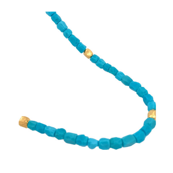Silverhorn Turquoise nuggets set in 18 kt. Rose gold