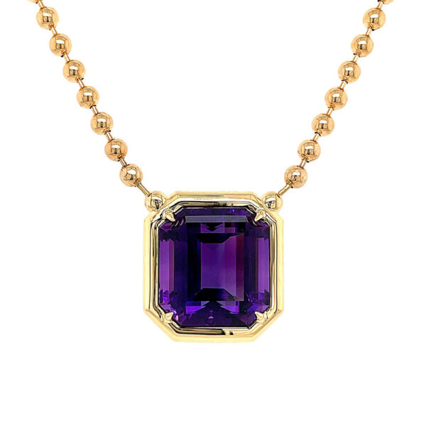 Silverhorn Jewelers Amethyst Pendant set in 18kt yellow gold. 18kt yellow gold solid ball chain is attached to the pendant