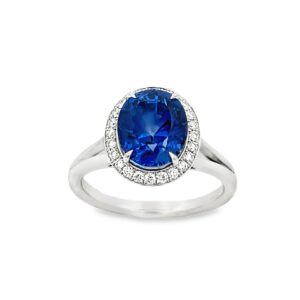 Oval cut Blue Sapphire set in platinum with diamonds