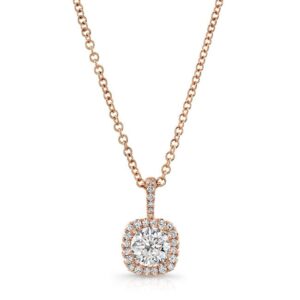 18 karat rose gold diamond pendant with 0.90cts. diamond and accented by diamonds