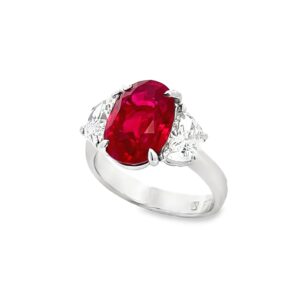Handmade ring with Oval Cut Ruby and two side diamonds